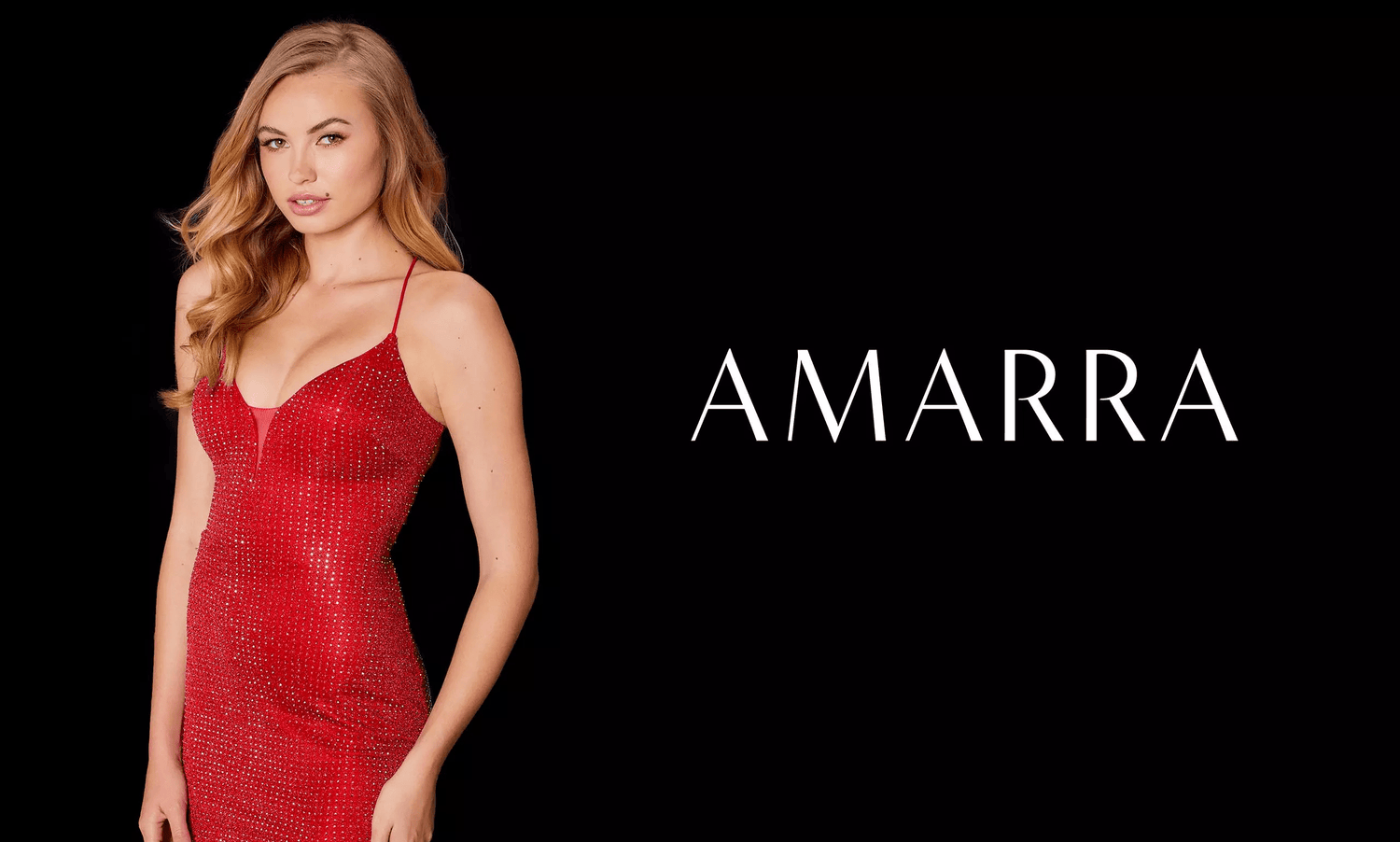 Model in a fitted red crystal-covered dress against a black background