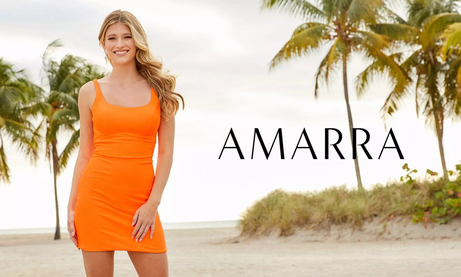 Model in a bright orange square-neck mini dress on a palm-lined beach
