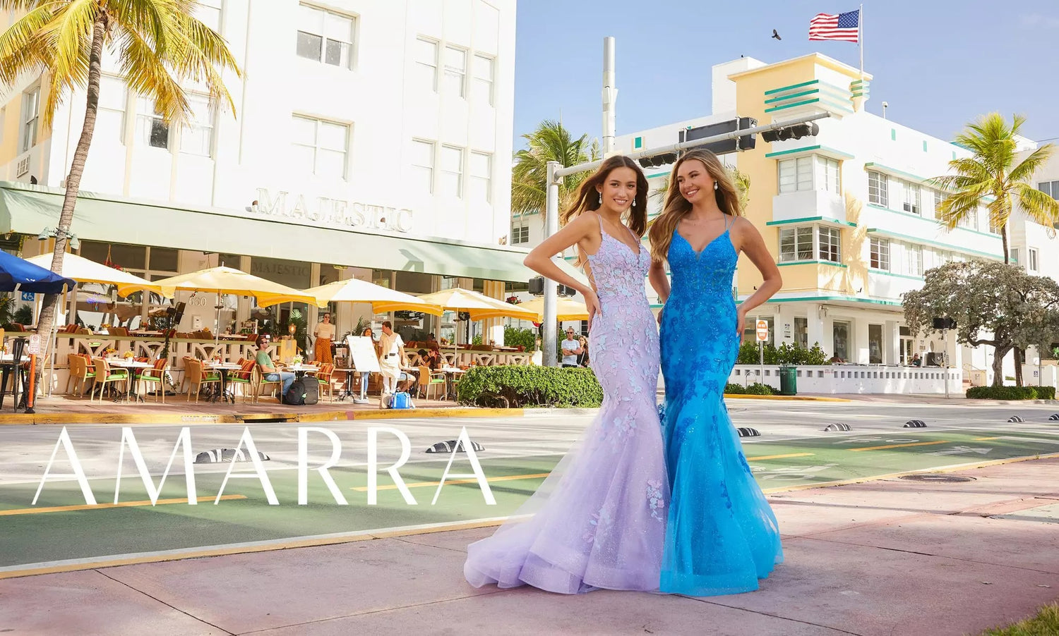 Two models in lilac and turquoise lace mermaid gowns on a South Beach sidewalk