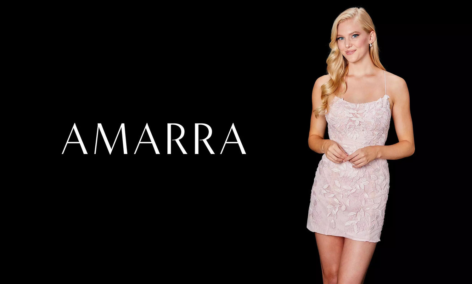 Blonde model in a blush pink lace fitted mini dress on a black Amarra banner