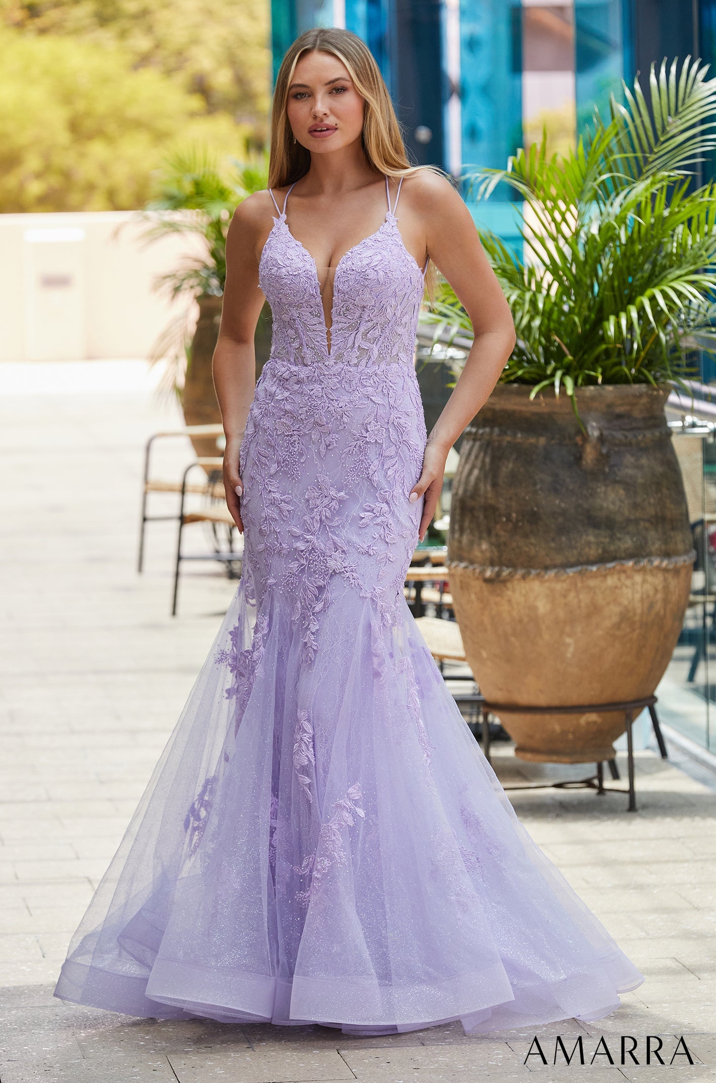A lavender lace mermaid gown with double spaghetti straps and a sparkly tulle skirt.