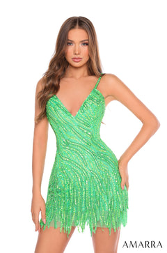 A woman wears a form-fitting, fringed Electric Lime sequin dress with a plunging V-neckline.