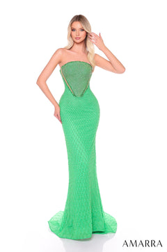 A slender model wears a strapless, beaded Electric Lime mermaid gown with a long train.