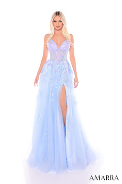 A woman wears a light blue corset-style gown with floral embellishments and a thigh-high slit.