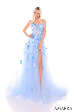 A model wears a light blue butterfly-adorned, sweetheart-neckline gown with a high side slit.