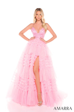 A flowing Candy Pink tiered tulle gown with a beaded bodice and high leg slit, styled on a model.