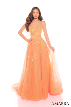 A full-length, glittery Orange ball gown with a fitted bodice and sweeping tulle skirt by Amarra.