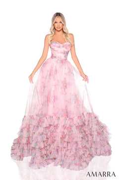 A flowing ball gown in Blush/Multi features a strapless bodice and multi-tiered ruffled skirt with floral print.