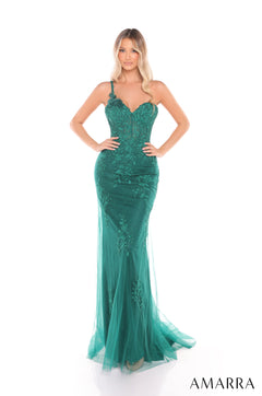 A floor-length emerald green lace and tulle mermaid gown with a sweetheart neckline and fitted silhouette.
