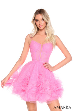 A woman wears a voluminous, sparkly Pink tulle party dress with a corseted bodice and ruffled skirt.