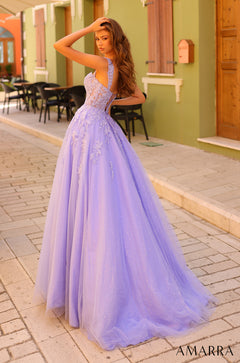 A lavender ball gown with floral lace details and a sparkling tulle skirt, posed on a brick pathway.