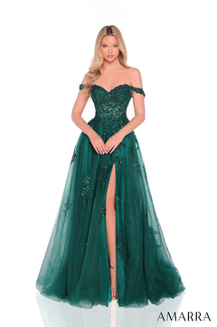 Model wears an off-shoulder emerald green ballgown with sequined bodice and high leg slit.