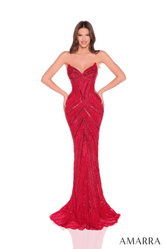 A model wears a form-fitting, strapless Red evening gown with shimmering geometric beaded lines.