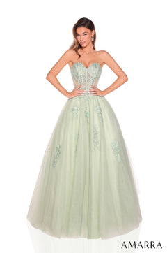 A strapless avocado green ball gown with a corset bodice and embellished tulle skirt.