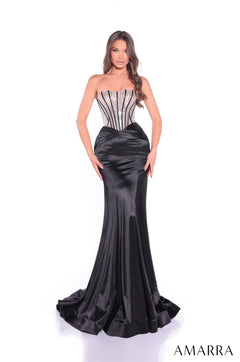 Model wears a strapless black satin gown with beaded corset bodice and dramatic mermaid-style train.
