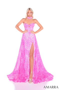 A model wears a strapless, full-length Fuchsia/Leopard/Print gown with a high slit and matching choker.