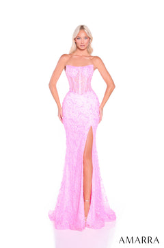 A strapless Barbie Pink sequined gown with a high slit and corset-style bodice stands against a white background.