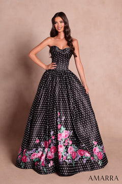 Amarra style 89624 long black polka dot dress with white dots, strapless sweetheart corset bodice and pink floral print along the hem of the a-line skirt, front view
