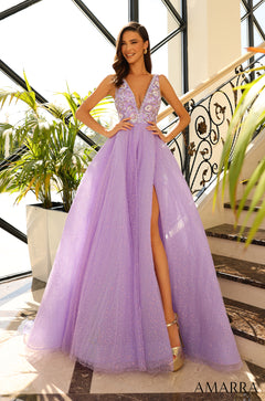 A model wears a sparkling lavender ball gown with a plunging neckline and high slit on a staircase.