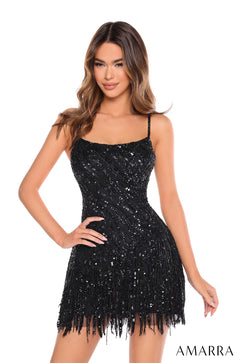 A model wears a Black sequined short dress with fringe hem and thin straps by Amarra.