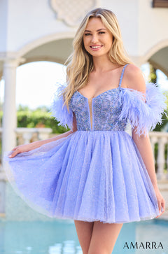A woman wears a periwinkle sparkly feathered short prom dress with a fit-and-flare silhouette.