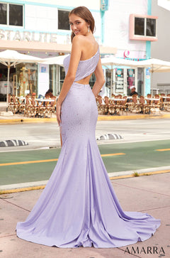 A lavender one-shoulder mermaid gown with sparkling details and a dramatic train, photographed on a street near a cafe.