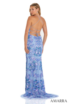 A blue floral sequin gown with a low back and criss-cross straps, photographed from behind on a model.