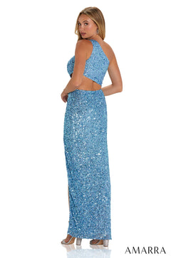 A blue sequined long evening gown with a cut-out back, styled on a model facing away in silver heels.